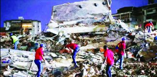 Rescuers scour for survivorso these rubbles from a collapsed building in Venezuela after two strong earthquakes struck struck the capital Caracas. BBC