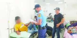 Police arrested alias “Ariel” (left) through the strength of an arrest warrant for qualified rape while confined at Dr. Rafael S. Tumbokon Memorial Hospital in Kalibo, Aklan at 3:20 p.m. on June 18, 2026. AKLAN PPO PHOTO