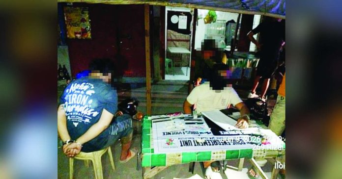 Police operatives inventory the suspected shabu and a caliber .45 pistol recovered from alias “Chad” (left), who was caught on June 8 in Barangay Rizal Lapuz Sur, Lapuz, Iloilo City. ICPO PHOTO