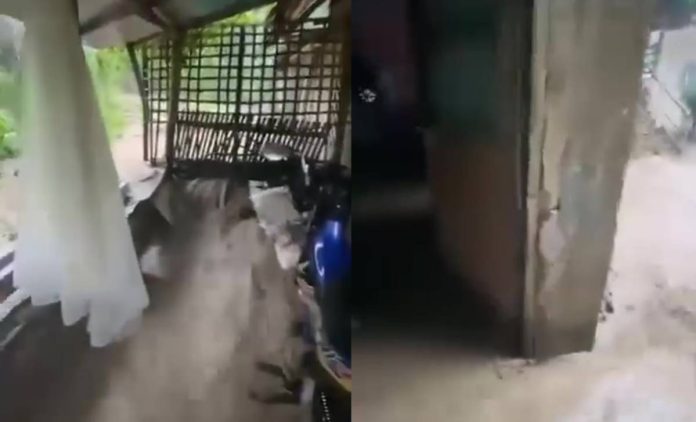 antique flooding Rushing floodwaters swamped the home of a resident in Barangay Igdalaguit, Tobias Fornier, Antique on Wednesday, June 24, 2026. Joy Obani (Screenshot)