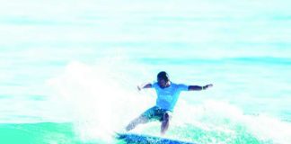 A surfer rides the wave in Baler, Aurora, known as the birthplace of Philippine surfing. According to the Department of Tourism, domestic travel remains a strong driver of tourism in the Philippines. DOT/TOURISM PHILIPPINES PHOTO