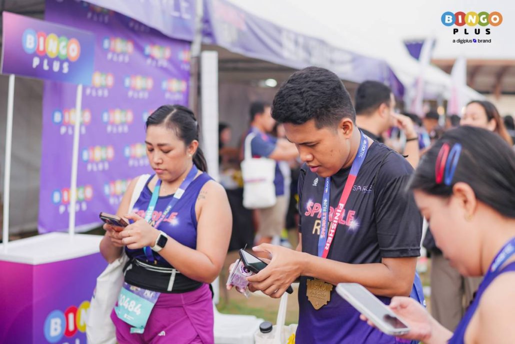 Runners visit the BingoPlus booth