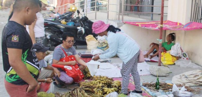 child in market A young boy accompanies his mother as she sells fruits and vegetables at the La Paz Public Market in Iloilo City. The Department of Labor and Employment (DOLE) Region 6 emphasized that they are continuously profiling and monitoring child labor cases across Western Visayas. To date, DOLE has monitored 2,064 child laborers in the region, with Iloilo Province recording the highest number at 824, followed by Antique (482), Capiz (455), Guimaras (221), and Aklan (82). AJ PALCULLO/PN