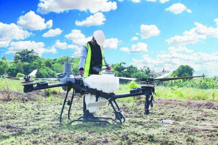 READY FOR TAKEOFF. An agricultural drone undergoes field preparation before deployment in one of the pilot rice farms in Iloilo Province under the Department of Agriculture’s Agri Drone Project. The technology-driven initiative provides free drone-assisted farming services across 2,146 hectares in 16 Iloilo municipalities this wet cropping season to help farmers improve efficiency, reduce production costs, and boost rice yields. DA-6