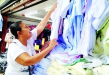 UNIFORMS THAT BUILD DREAMS: Sidewalk vendors in downtown Iloilo stitch together futures For 63-year-old Gene Sanchez of Barangay Bo. Obrero, La Paz, Iloilo City, selling school uniforms has been the means by which she and her husband, a pedicab driver, raised and educated their children. IME SORNITO/PN