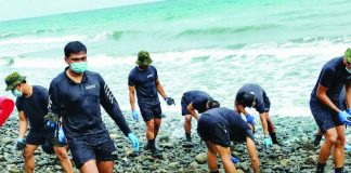COASTAL CLEANUP. Soldiers, municipal responders, and volunteers remove algae deposits from the shoreline of Miag-ao, Iloilo as local authorities intensify cleanup efforts following an algal bloom incident that affected 86 residents in three coastal barangays. The town government has issued health advisories and urged the public to avoid exposure to affected waters pending further assessment. PHOTOS FROM MIAGAO INFOCEN