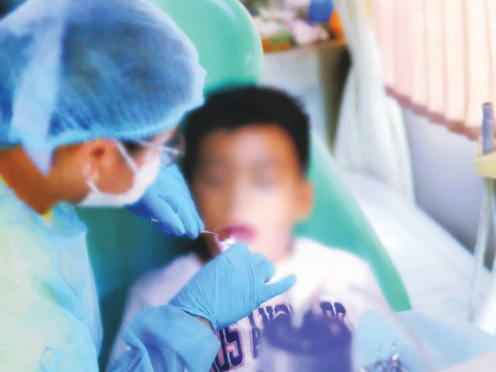 neljoy oral health copy A young patient undergoes a dental examination. According to the Department of Health, poor oral health affects the well-being of many Filipinos and contributes to broader health complications. It this thus campaigning for proper oral hygiene practices and raising awareness on the importance of oral health as part of overall well-being. DOH-6