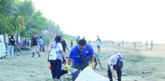 Volunteers from the Department of Environment and Natural Resources – Region 6, local government units, and community groups scour the shoreline of Oton, Iloilo during a coastal cleanup in celebration of World Oceans Day. They collected 72 sacks of garbage weighing 524.9 kilograms, highlighting the continuing fight against plastic pollution. DENR-6
