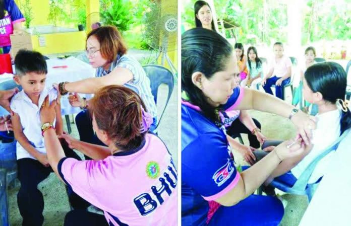 Iloilo schoolchildren receive vaccines against measles, rubella, tetanus, and diphtheria, and even the Human Papilloma Virus vaccine for girls in this undated photo.