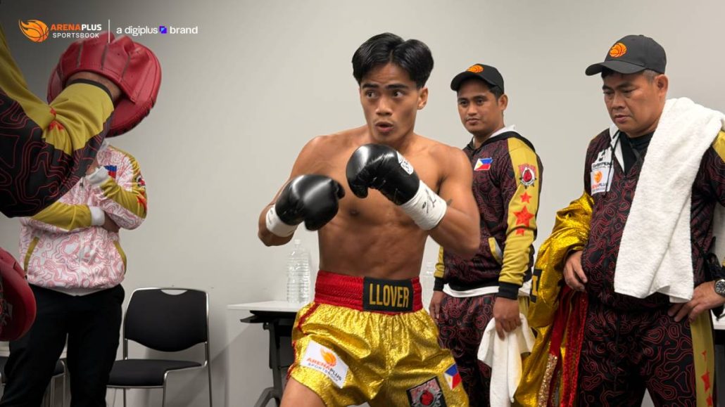 Kenneth Llover warms up inside the dugout minutes before his IBA bantamweight title eliminator bout.