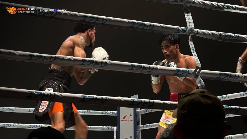 Kenneth Llover absorbs his first professional loss at the hands of Michael Angeletti during their fight at the Aichi Sky Expo.