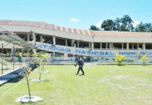 A man walks past a collapsed school building of the Matanao National High School after an earthquake in Matanao, Davao del Sur, Mindanao, Philippines Monday, June 8, 2026. AP