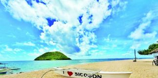 A boat rests on the shores of Buaya Beach, a famous tourist spot in Barangay Buaya on Sicogon Island, Carles, Iloilo. The Carles municipal government assured the public that the island's famed white-sand beaches and natural landscape remain intact and open to both local and foreign tourists, despite the closure of luxury accommodations and villas operated by the Sicogon Island Tourism Estate Corporation. DISCOVER POTOTAN/FACEBOOK PHOTO