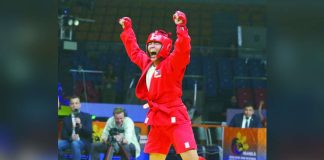 GOLDEN FINISH. Aislinn Agnes Yap celebrates after successfully defending her women’s 80kg combat sambo title, sealing the Philippines’ third gold medal and a fifth-place overall finish in the 11th Asia-Oceania Sambo Championships at the Ninoy Aquino Stadium. POC PHOTO