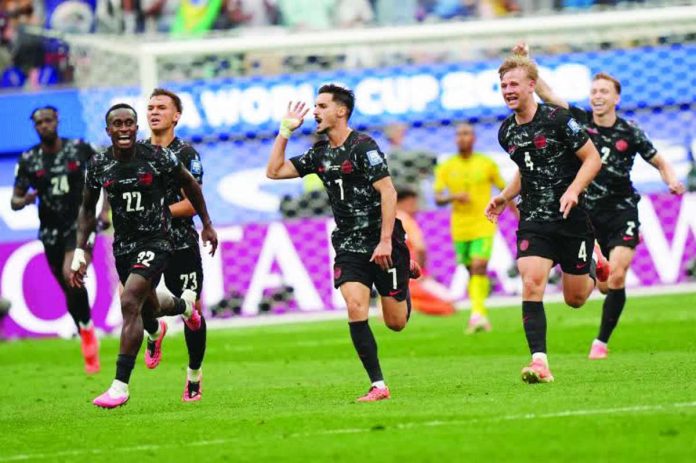 sports_FIFA_Canada_copy_compressed_resized Canada’s Stephen Eustáquio celebrates after firing the stoppage-time winner that sealed a historic 1-0 victory over South Africa and sent the co-hosts into the FIFA World Cup Round of 16 at SoFi Stadium in Inglewood, California. AP PHOTO/ANDRE PENNER