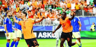 Brian Brobbey celebrates with teammates after scoring one of his two goals as the Netherlands overwhelmed Sweden, 5-1, to take command of Group F in the 2026FIFA World Cup at NRG Stadium in Houston, Texas.