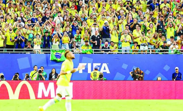 Neymar Jr. receives a rousing ovation from Brazilian supporters after making his long-awaited return from injury during Brazil’s 3-0 victory over Scotland at Hard Rock Stadium in Miami, Florida, sending the Seleção into the knockout stage of the 2026 FIFA World Cup. PHOTO COURTESY OF YAHOO SPORTS