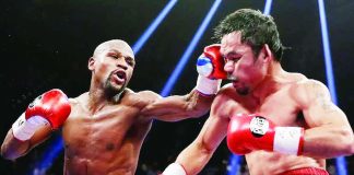 Floyd Mayweather Jr. lands a punch against Manny Pacquiao during their first meeting on May 3, 2015. Mayweather won the historic bout via unanimous decision. PHOTO COURTESY OF THE MARCA WEBSITE