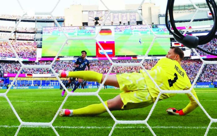 sports_Paraguay_compressed_resized Germany goalkeeper Manuel Neuer fails to stop the penalty kick of Paraguay’s Gustavo Gómez during the shootout that sent the South Americans into the Round of 16 of the 2026 FIFA World Cup. AFP