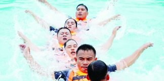 Participants performed the Centipede Formation Line drill at Stage 2 of the Paghangkat it Busalian (Obstacle Course Race) at the Binirayan Swimming Pool during the opening event of the 3rd Regional Rescuelympics 2026 in San Jose de Buenavista, Antique, on July 26. The challenge tested the teams' coordination, teamwork, and agility in simulated rescue operations. PROVINCE OF ANTIQUE PHOTO