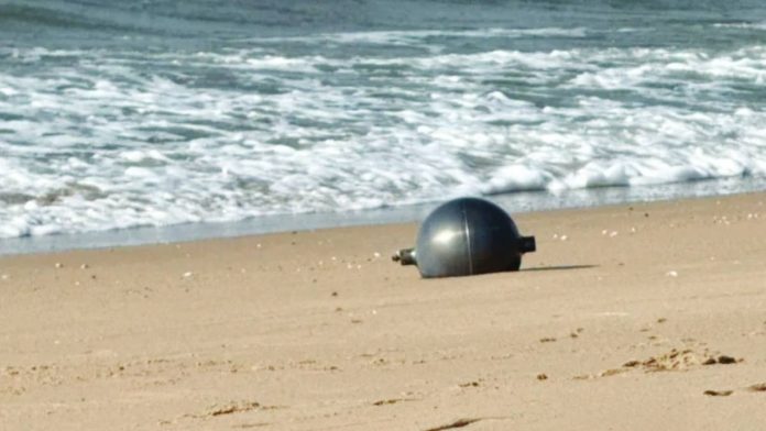 Australia One of the six mysterious large silver spheres washed up on Forrest Beach in Queensland, Australia. Authorities warned local residents that the spheres could be "potentially hazardous objects". QUEENSLAND FIRE DEPARTMENT