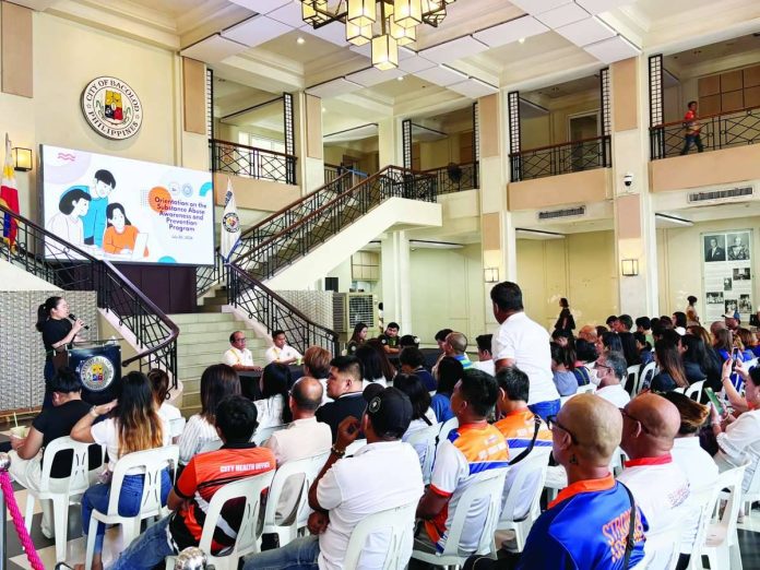 Bacolod_program_copy_compressed_resized Employees of the Bacolod City Government attended the first day of the Substance Abuse Awareness and Prevention Program orientation at the Bacolod City Government Center. The three-day orientation serves as a prerequisite to the implementation of mandatory random drug testing under the city's Drug-Free Workplace Program. MAE SINGUAY/PN