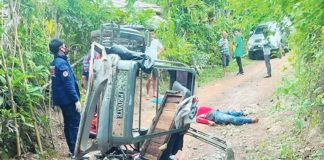 A delivery rider lay near his parcel delivery tricycle after he was shot dead by two unidentified motorcycle-riding suspects shortly after completing a delivery in Sitio Ilaya, Barangay Sibaguan, Roxas City, Capiz, on July 28. Police investigated the incident after confirming that none of the victim's money or personal belongings had been taken. BRIGADA FM ROXAS PHOTO