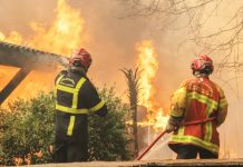Firefighters battle flames in Lège-Cap-Ferret, south-western France. EPA