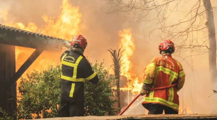 France Firefighters battle flames in Lège-Cap-Ferret, south-western France. EPA