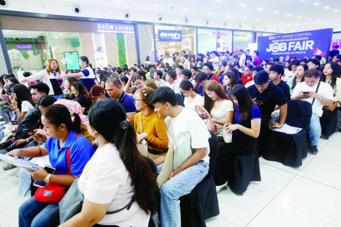 Job seekers flock to the Labor Day job fair in Caloocan City, in this photo taken on May 1, 2026. Employees who belong to Generation Z, or those born between 1997 and 2012, are the least happy and most stressed among Filipino workers, with nearly 4 in 10 saying they often “dread” going to work. PNA