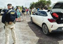 More than 1,000 arrested as part of global human trafficking crackdown A federal highway policeman in Brazil stands a few yards from a white dusty car that has its boot open. In the background, an officer can be seen talking to a woman, while a row of about a dozen people is lined up on the roadside. INTERPOL