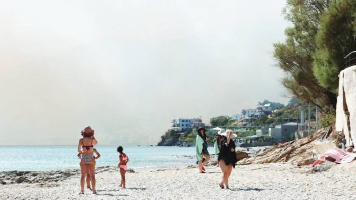 Greece Smoke fills the sky as fire burns through mixed agricultural and forest land in Plomari, Lesvos, Greece. EPA/SHUTTERSTOCK