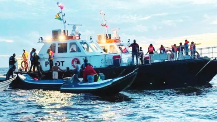 Guyana’s rescue boats take part in a search and rescue operation after a ferry capsized near Iron Punt. PRIME MINISTER MARK PHILLIPS / FACEBOOK