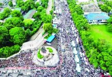 Photo taken on Tuesday, June 30, 2026, shows participants of a rally by members of Iglesia Ni Cristo at the People Power Monument along Epifanio de los Santos Avenue, which went on until July 1, Wednesday. They moved to Liwang Bonifacio on July 2 after mounting public complaints of inconvenience due to traffic congestion. PHOTO COURTESY OF QCPD