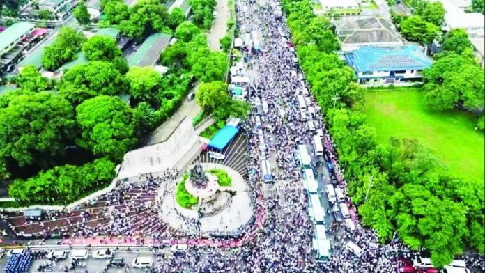 INC_copy_compressed_resized Photo taken on Tuesday, June 30, 2026, shows participants of a rally by members of Iglesia Ni Cristo at the People Power Monument along Epifanio de los Santos Avenue, which went on until July 1, Wednesday. They moved to Liwang Bonifacio on July 2 after mounting public complaints of inconvenience due to traffic congestion. PHOTO COURTESY OF QCPD
