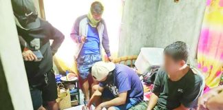 Police operatives arrested alias “Boy” (right), 41, a newly identified high-value individual, and seized around 340 grams of suspected shabu approximately valued at P2.31 million during a buy-bust operation on July 10, 2026 in Barangay Jelicuon Montinola, Cabatuan, Iloilo. IPPO PHOTO
