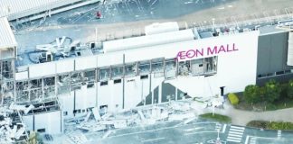 This is a birds-eye view of the quake-hit Aeon Mall with broken windows and debris in the carpark. The second floor of the mall collapsed, leaving many people trapped inside. REUTERS