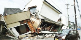 Houses collapse in the Kyushu region of Japan due to a powerful earthquake which left at least 13 people dead. REUTERS