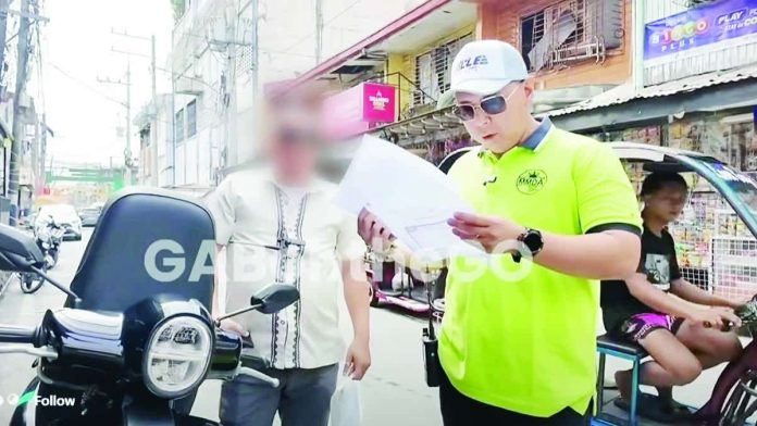 MMDA_copy_compressed_resized Gabriel Go, chief of the Metropolitan Manila Development Authority - Special Operations Group–Strike Force, will temporarily refrain from conducting clearing operations while his viral video involving a helmetless teacher is under investigation. PHOTO FROM GABRIEL GO FACEBOOK