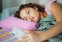 EU threatens Meta with fines over ‘addictive’ Facebook and Instagram A young woman with a glum expression scrolls on her smartphone. GETTY IMAGES