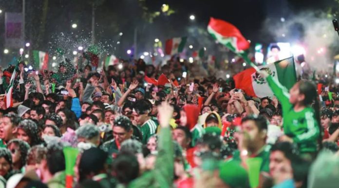 Mexico A huge crowd of fans wearing Mexico’s green football kit and waving the country’s flag celebrate the team’s 2-0 World Cup win against Ecuador in Mexico City. More than one million people took to the streets of Mexico City following Mexico’s win in the knockout stages. GETTY IMAGES