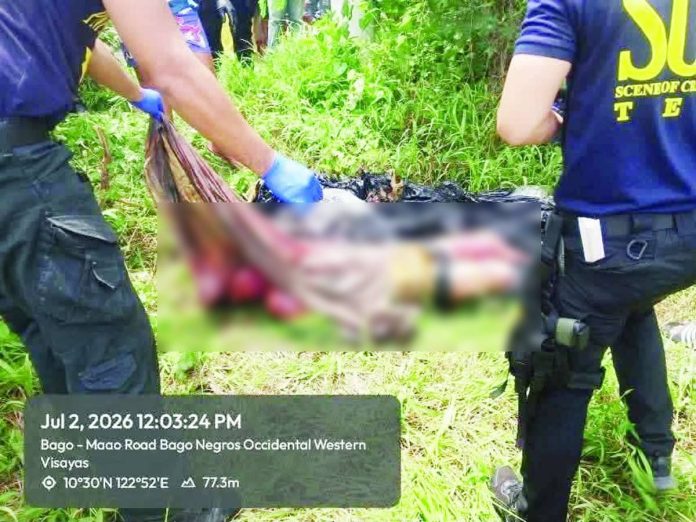 Crime scene investigators examined the body of a 26-year-old Bacolod resident, identified only by the alias “Mickey,” after it was found wrapped in plastic and packaging tape in a sugarcane field in Barangay Pacol, Bago City, Negros Occidental, on July 2. Police have launched a full-scale investigation to identify the perpetrators and determine the motive behind the killing. PRO-NIR PHOTO