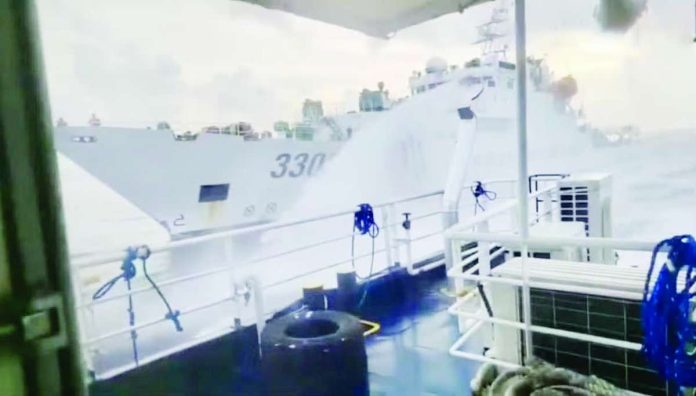 PCG_WPS_copy_compressed_resized A China Coast Guard vessel fired a water cannon at a Philippine fisheries vessel delivering fuel subsidies to Filipino fishermen at Panatag Shoal on July 23, 2026, four days before President Ferdinand Marcos Jr. delivered his State of the Nation Address where he called for national unity in defending the West Philippine Sea. This photo is a screengrab from the video posted by Philippine Coast Guard spokesperson for the West Philippine Sea Rear Adm. Jay Tarriela.