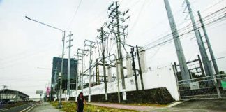 The Luzon and Visayas power grids returned to normal operations after red aThe Department of Energy attributes last June’s jump in power rates to the tight power situation in the Visayas, which was put under numerous yellow alerts, with some days even witnessing red alerts. Photo shows the Manila Electric Co. substation along Commonwealth Avenue in Diliman, Quezon City. PNA PHOTO BY JOAN BONDOC