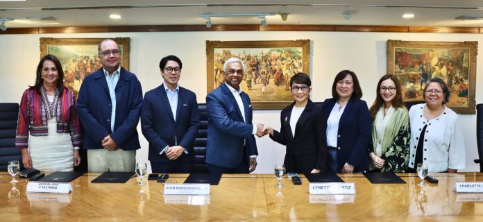 Supporting Photo - ARC x LANDBANK LANDBANK President and CEO Lynette V. Ortiz (center right) and WEnergy Global CEO Atem S. Ramsundersingh (center left), together with partners, Archipelago Renewables Corporation President Quintin Jose V. Pastrana (3rd from left), Maharlika Clean Power Holdings Corporation Treasurer Jose Antonio Gozun (2nd from left), LANDBANK EVP Charlotte I. Conde (3rd from right), and FVP Ann Marijell B. Ong (2nd from right), formalize an ₱800-million financing agreement to deploy hybrid renewable energy-powered microgrids in underserved communities in Palawan. Also present as witnesses are H.E. Ambassador of the Netherlands Marielle Geraedts (leftmost) and Department of Energy (DOE) Undersecretary Rowena Cristina L. Guevara (rightmost).