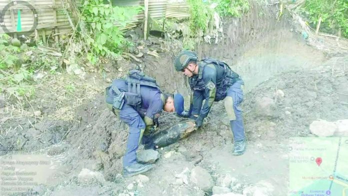 Talisay_bomb_copy_compressed_resized Personnel of the Provincial Explosive Ordnance Disposal (EOD)/K9 Unit recovered an M47 100-pound White Phosphorus bomb believed to be from World War II after it was unearthed during excavation work for a flood control project in Hacienda Minilu-an, Barangay Matab-ang, Talisay City, Negros Occidental, on July 22. The unexploded ordnance was safely rendered harmless before being transported for proper disposal. PRO-NIR PHOTO