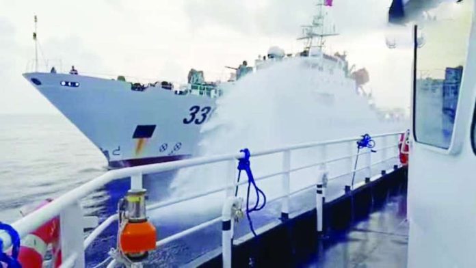 Trump_PH_copy_compressed_resized A Chinese coast guard ship fires a water cannon at a Philippine vessel, in this screengrab taken from a Philippine Coast Guard handout video released on July 23, 2026 at the West Philippine Sea. United States President Donald Trump has committed to personally raise the Philippines’ sea dispute concerns with Chinese President Xi Jinping in their next meeting. JAY TARRIELA VIA X