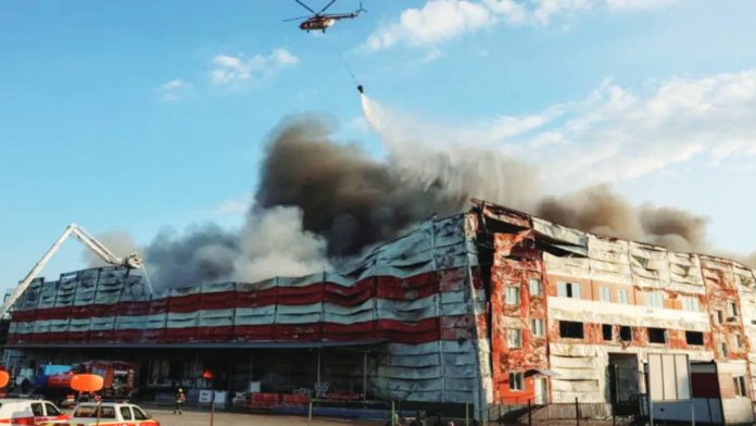Ukraine A firefighting helicopter drops water over the site of a Russian missile strike, amid Russia's attack on Ukraine, in Kyiv region. The latest Russian strikes hit both residential and non-residential buildings. REUTERS