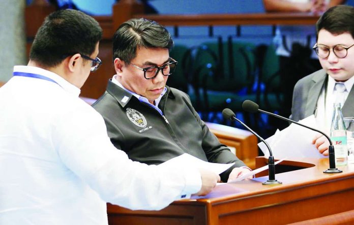PROSECUTION WITNESS. National Bureau of Investigation director Melvin Matibag (center) appears as a prosecution witness at the impeachment trial of Vice President Sara Duterte at the Senate in Pasay City on July 21, 2026. Matibag told the impeachment court that threats against the President of the Philippines transcend ordinary criminality and directly implicate national security. PNA