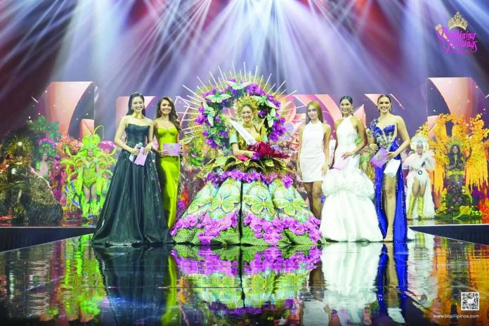 aklan_bet_copy_compressed_resized Pauline Thea Anne Ibuyan (center) receives her Bb. Tourism 2026 award. BINBINING PILIPINAS/FACEBOOK PHOTO